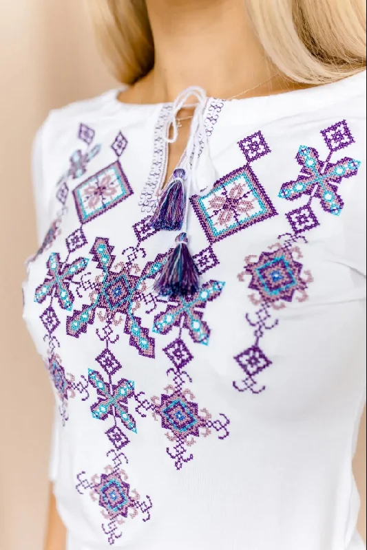 Trendy Casuals Women's short sleeve white shirt with cross-stitch embroidery. Purple Trendy Casuals Women's short sleeve white shirt with cross-stitch embroidery. Purple